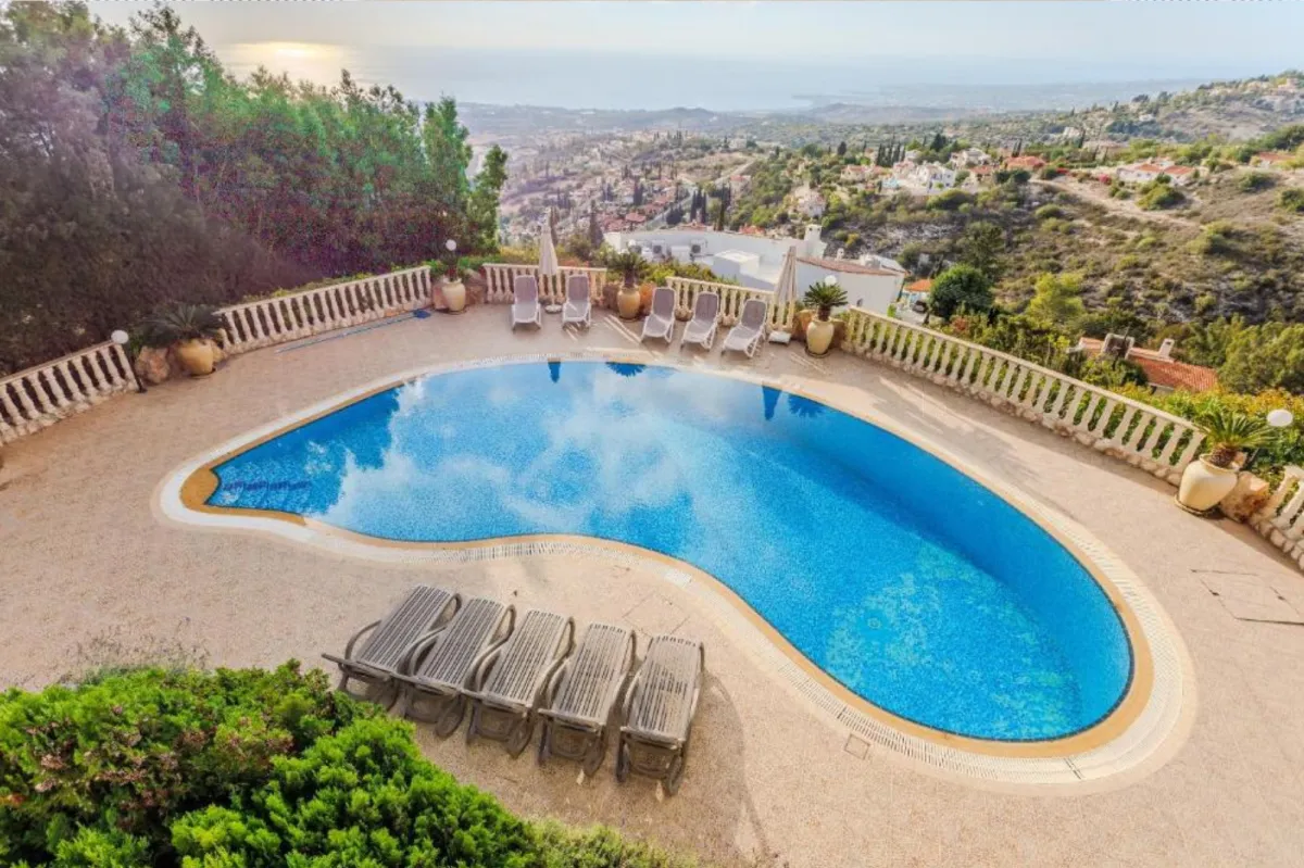 Sun-drenched private pool at the KEHA somatic retreat villa in Cyprus, perfect for nervous system integration.