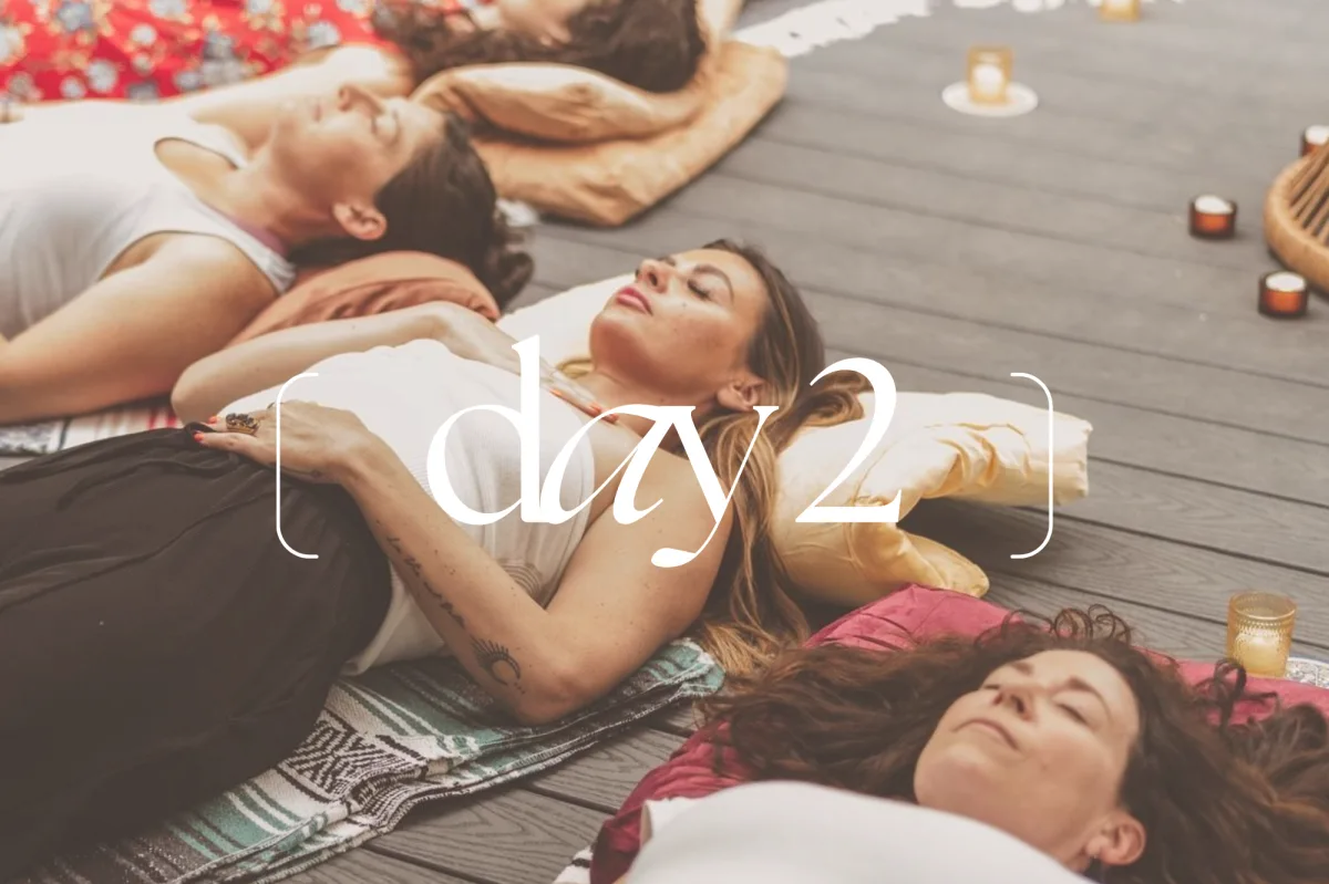 Intimate group of women in a somatic healing circle, fostering a safe container for emotional sovereignty.