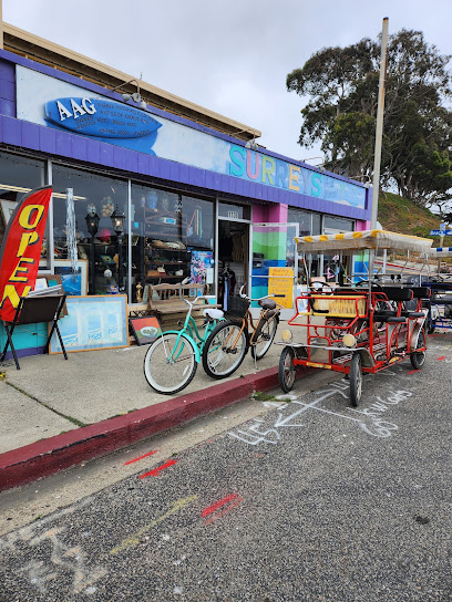 Two smiling shop founders, one holding a vintage clock and the other arranging a display of unique trinkets, inside a cozy, sunlit store filled with shelves of antiques and local memorabilia.