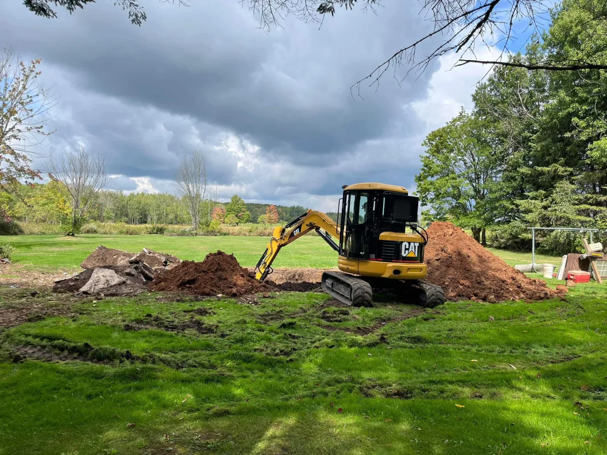 excavator digging a hole