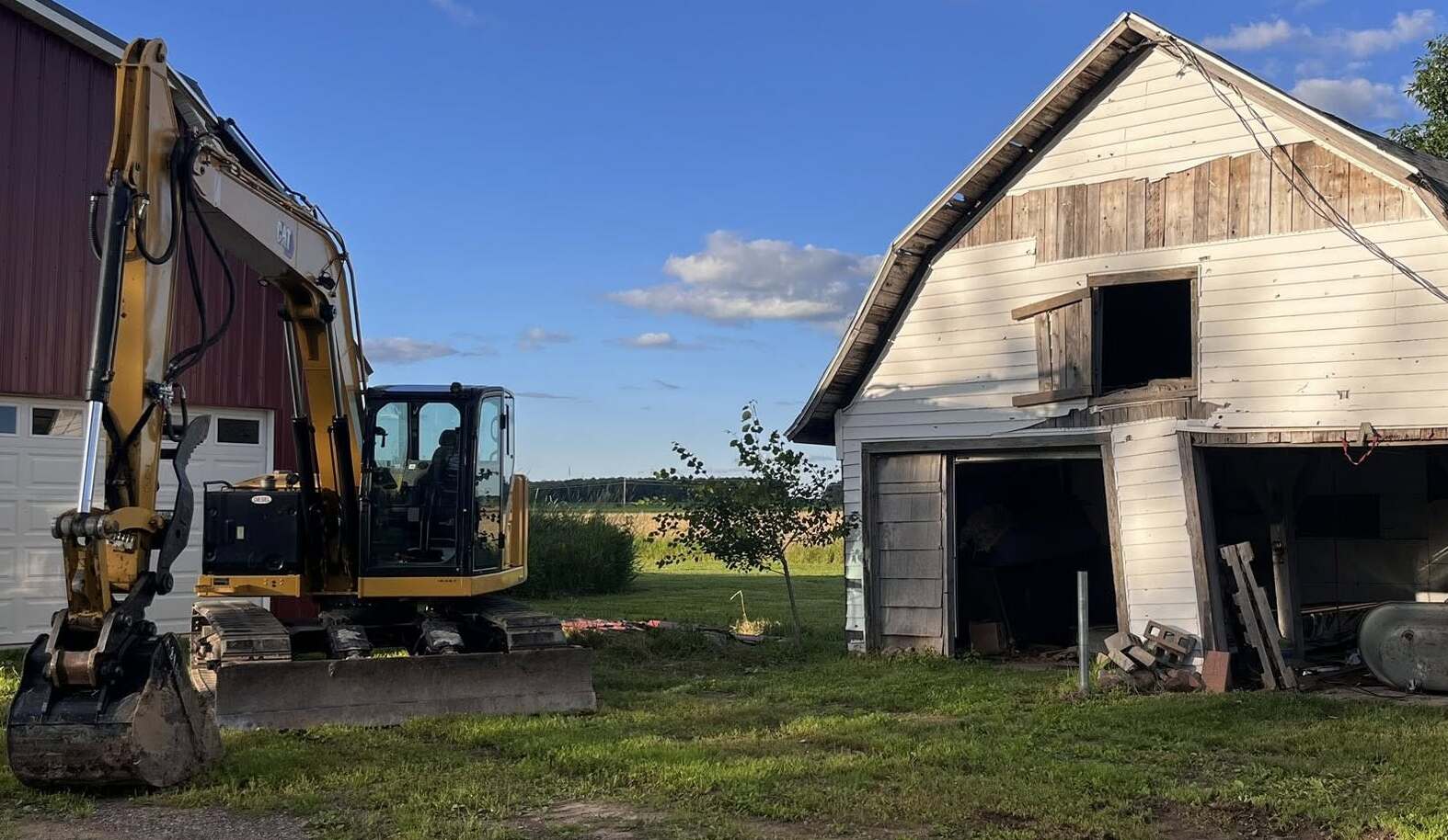 excavator doing demolition services