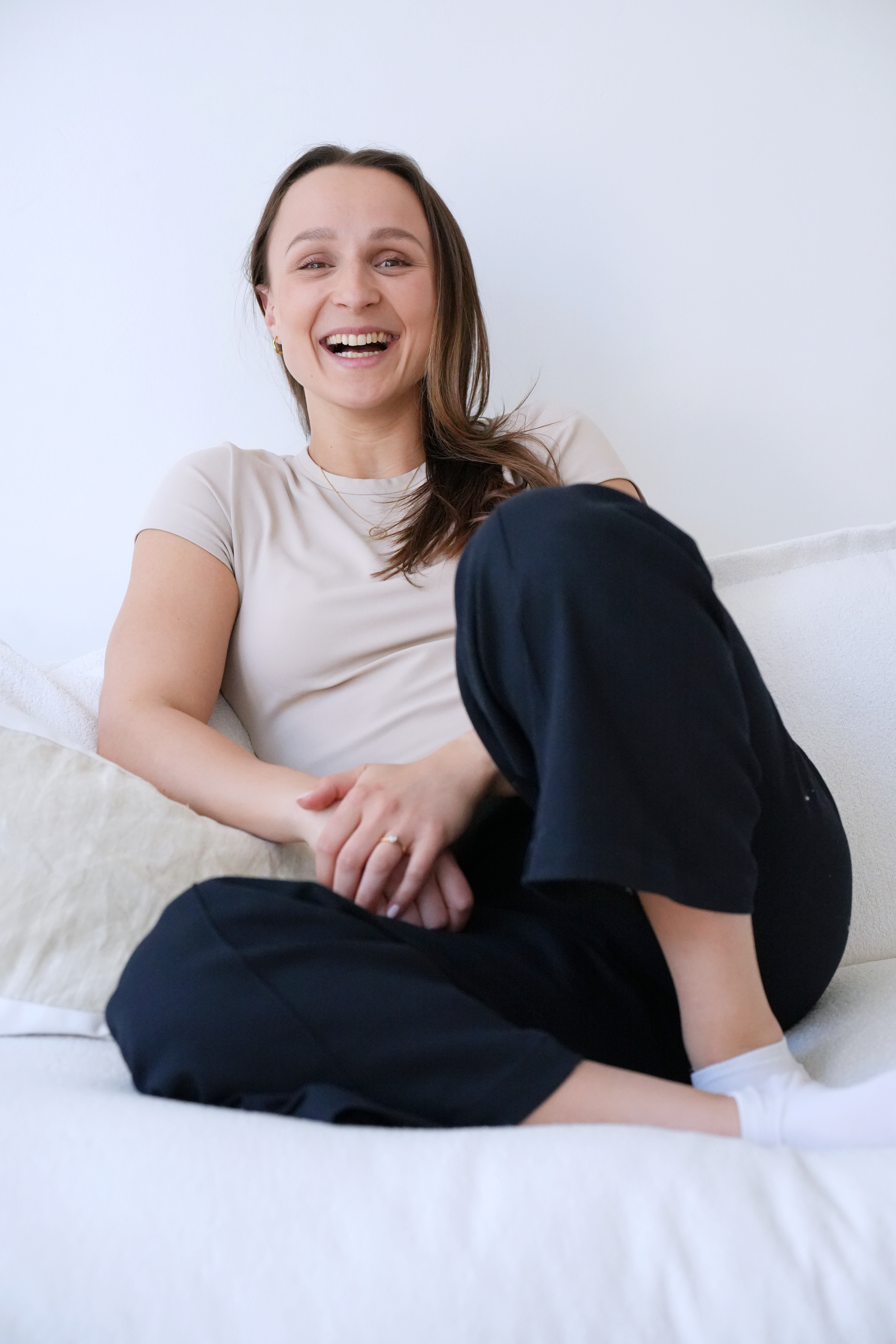 Freelancer smiling during a relaxed professional headshot session