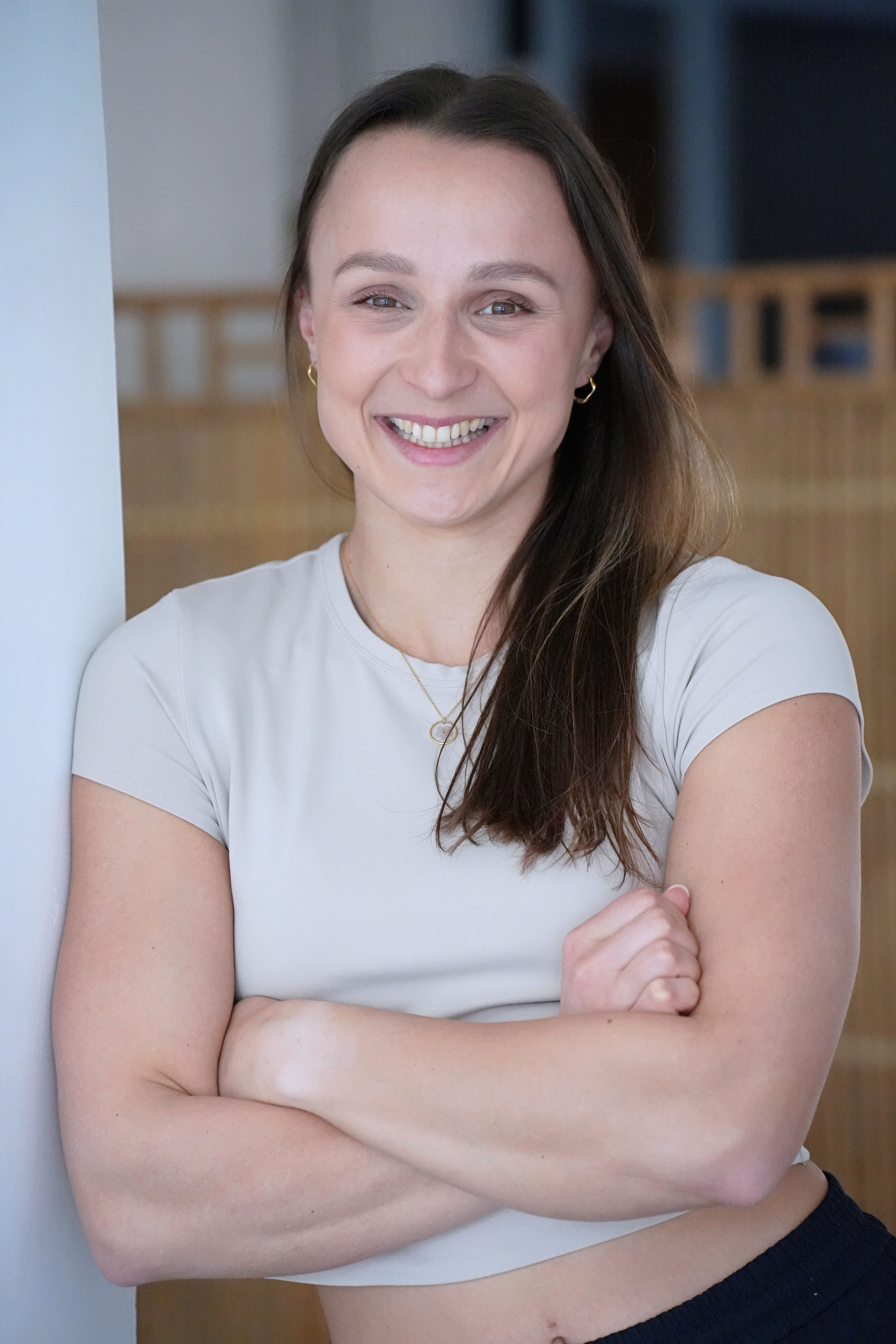 Freelancer smiling during a relaxed professional headshot session