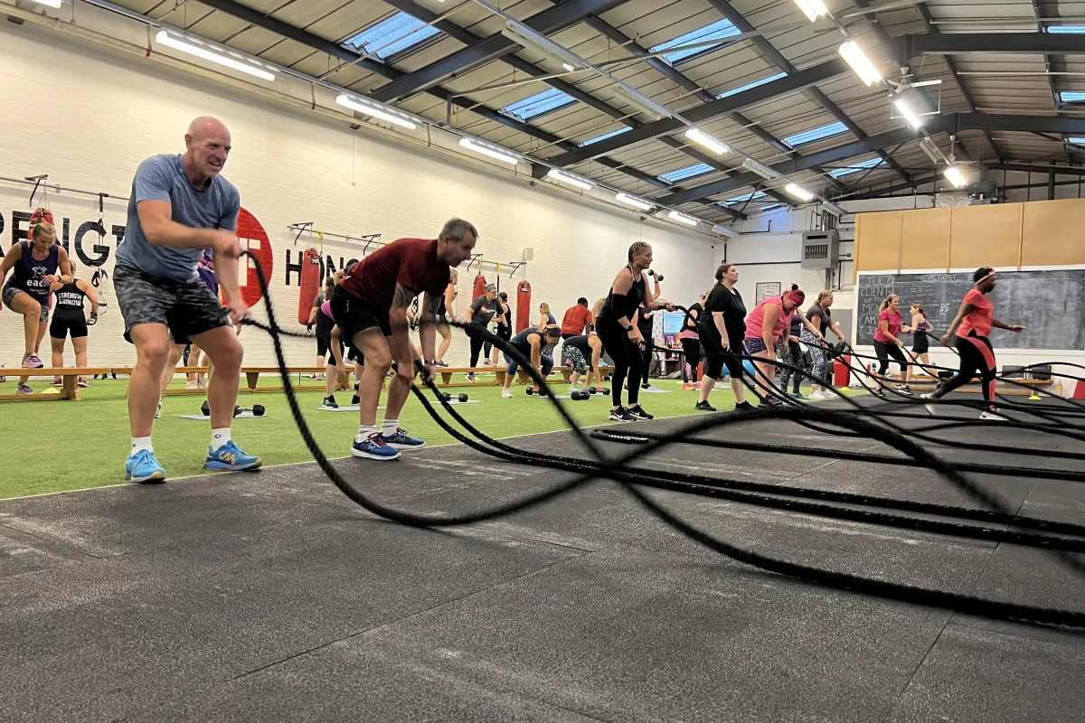 Smal group personal training with battle ropes