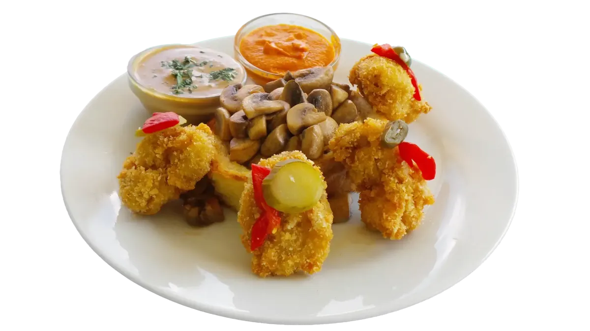Flasch City Restaurant-Cafe near Gloggnitz mit belegten Brötchen, Tapas und Happerls als Auswahl mit frittierten Happen, Pilzen und Dips auf dem Teller