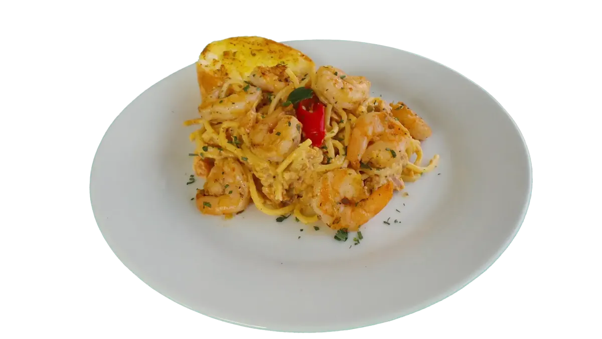 Cremige Garnelen-Pasta Spaghetti mit Knoblauchbrot im Flasch City italienischen Pasta Restaurant-Café knittelfeld