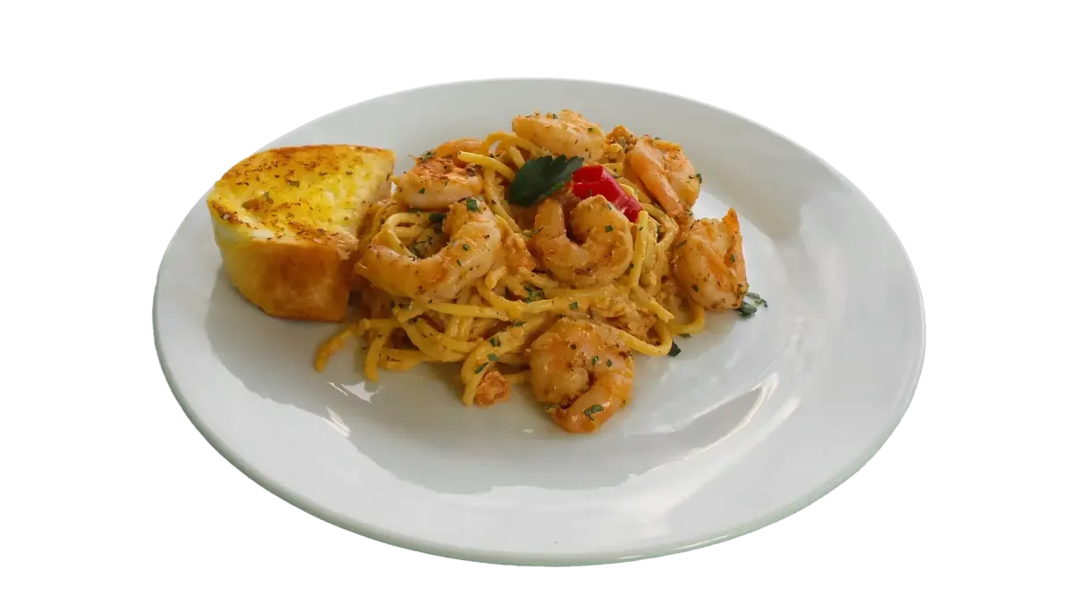 Cremige Garnelen-Spaghetti mit Knoblauchbrot im Flasch City italienischen Pasta Restaurant-Café muerzzuschlag