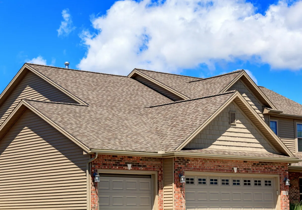 Asphalt Shingle roof installation on a modern house