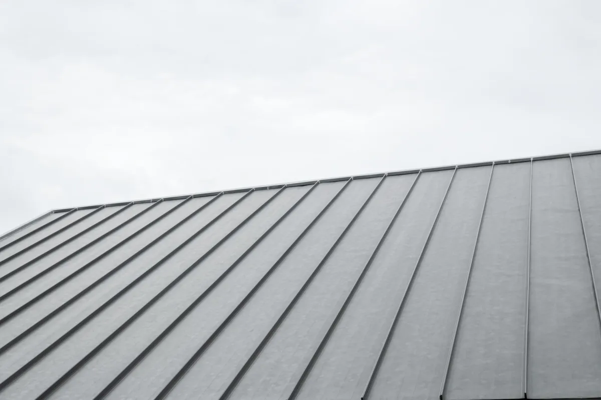 Black standing seam metal roofing job done by olsen's roofing