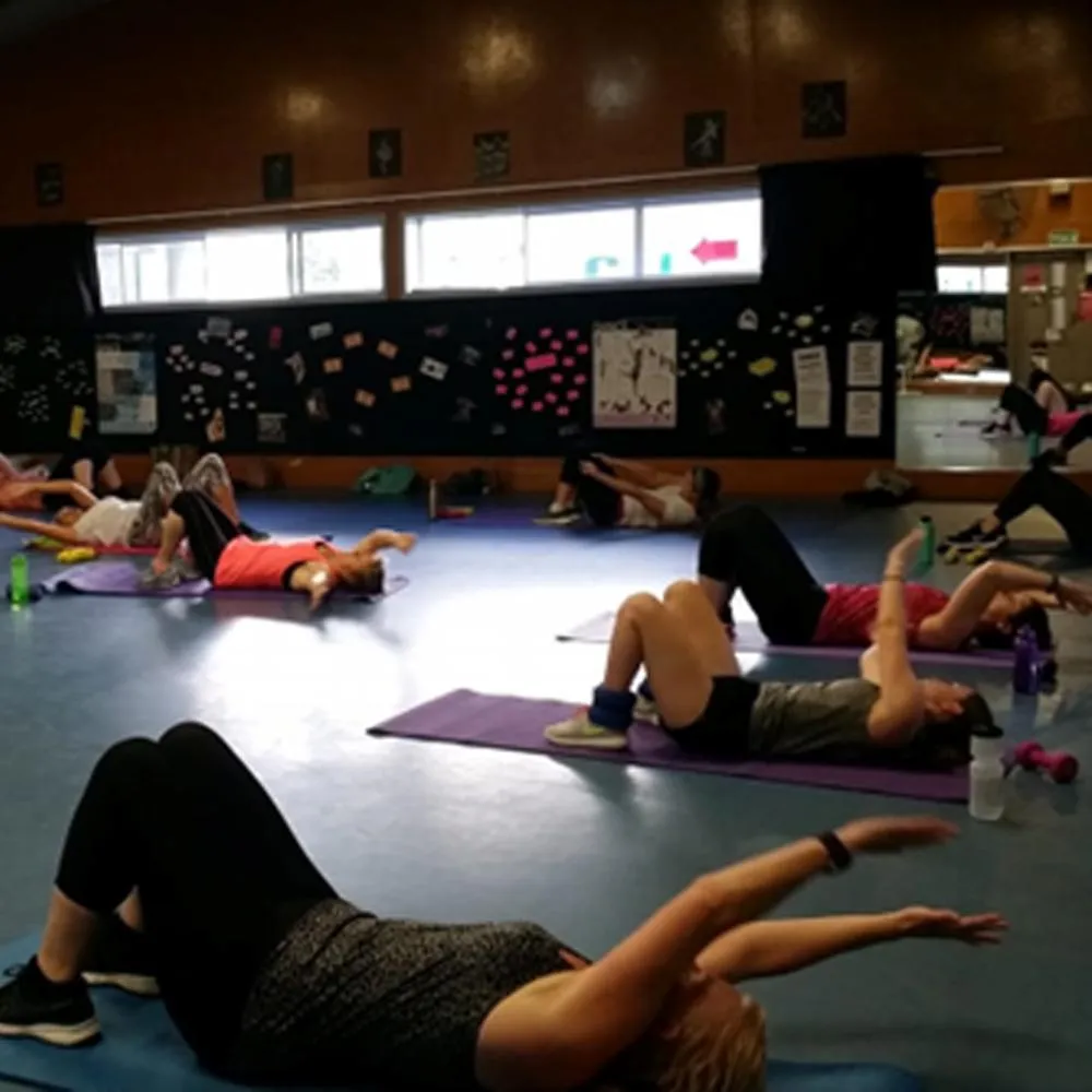 Relaxing stretch class for flexibility and recovery at The Fitness Collective