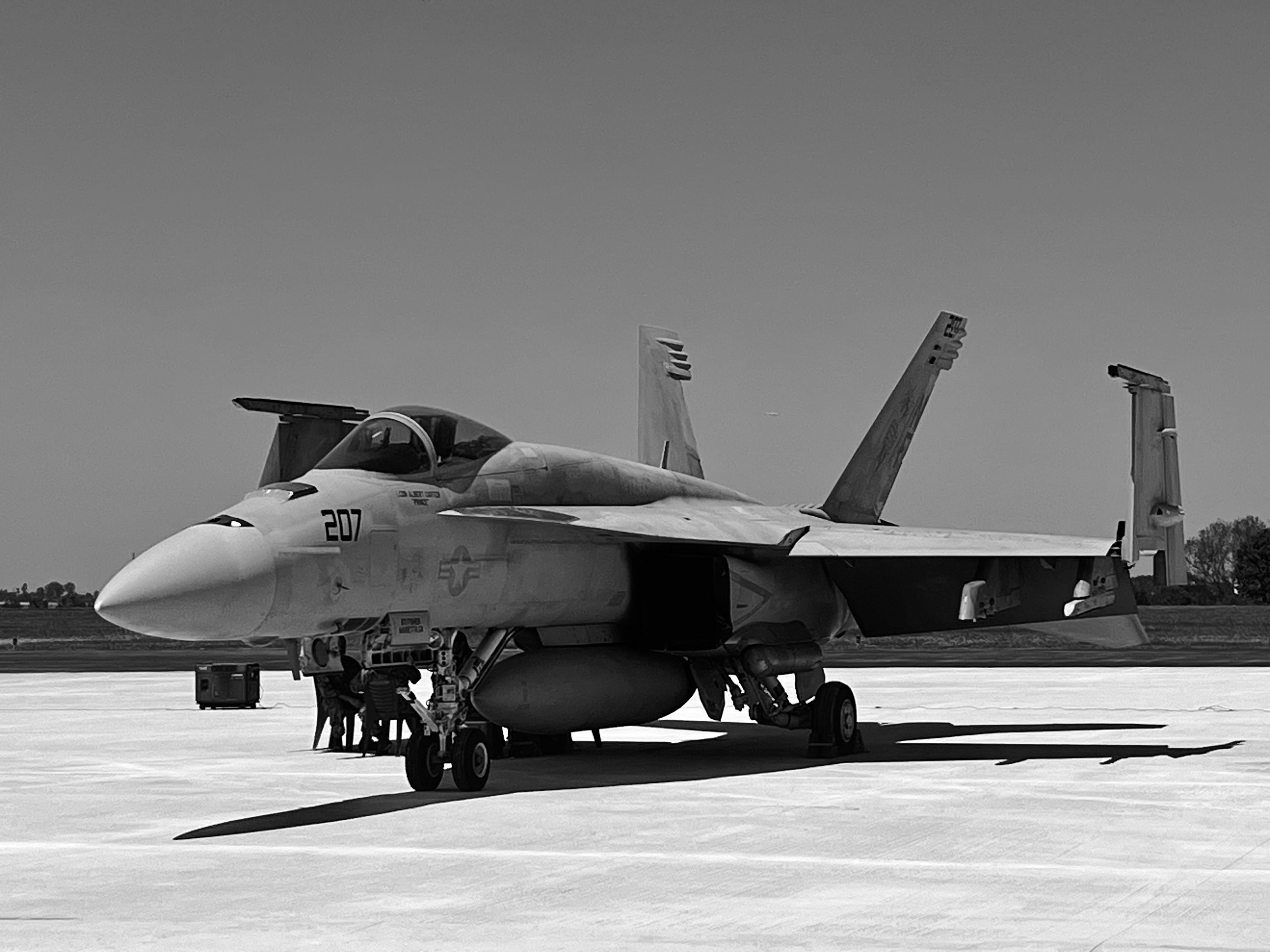 F/A-18 Super Hornet parked on flight line at a Naval Air Station, representing aircraft flown out of NAS Oceana in Virginia Beach