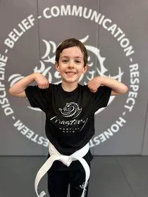 kids martial arts troy - muscle pose