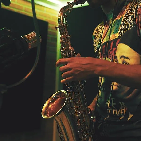 Saxophone player recording in the studio at Lil’ Drummaboy Recordings in Philadelphia.