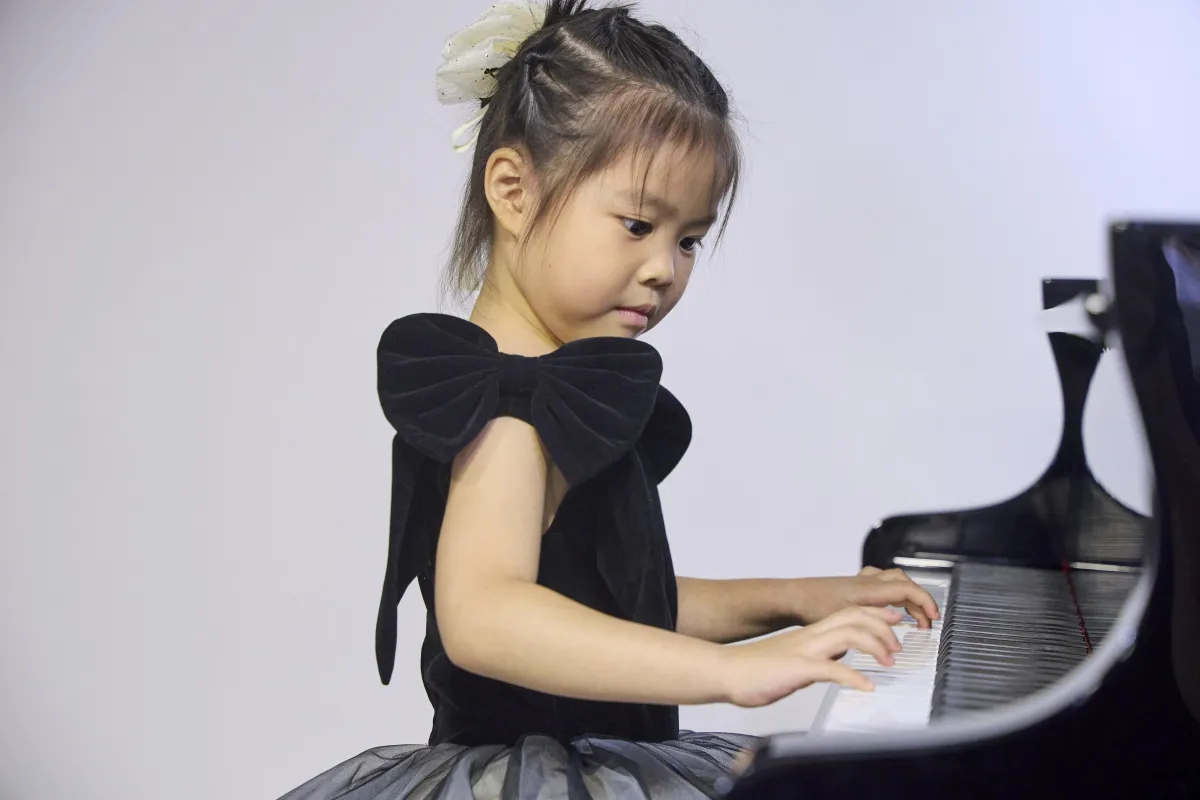 Girl practicing piano 