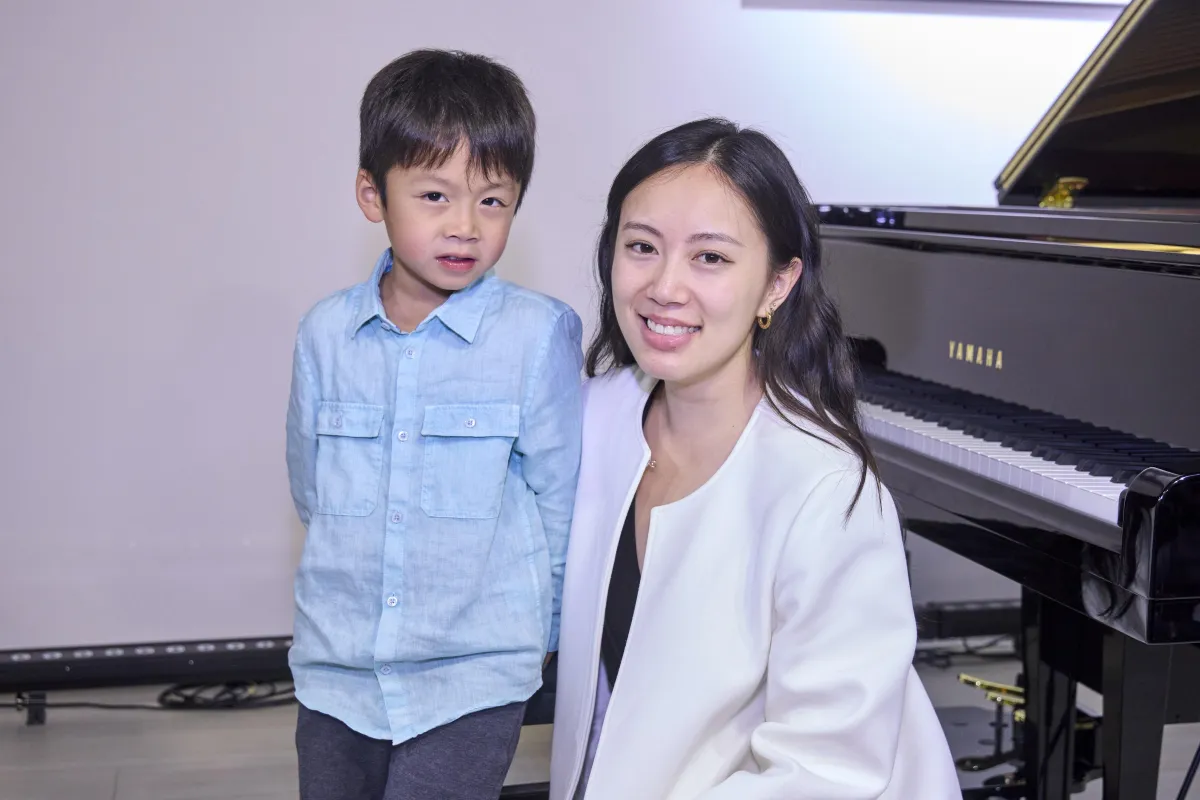 Music teacher with one of his students