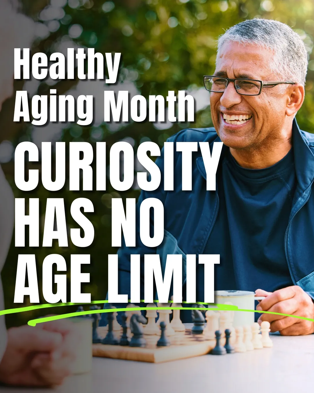 Active older adult smiling while playing chess outdoors during Healthy Aging Month, representing curiosity, lifelong learning, and healthy aging.