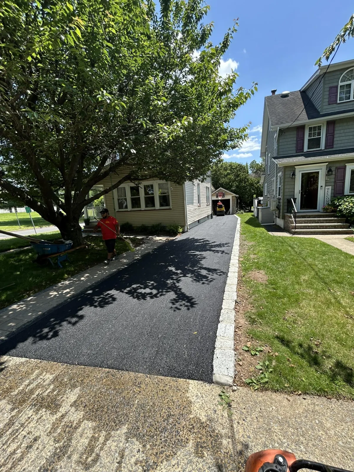 Freshly paved residential driveway in New Jersey suburb