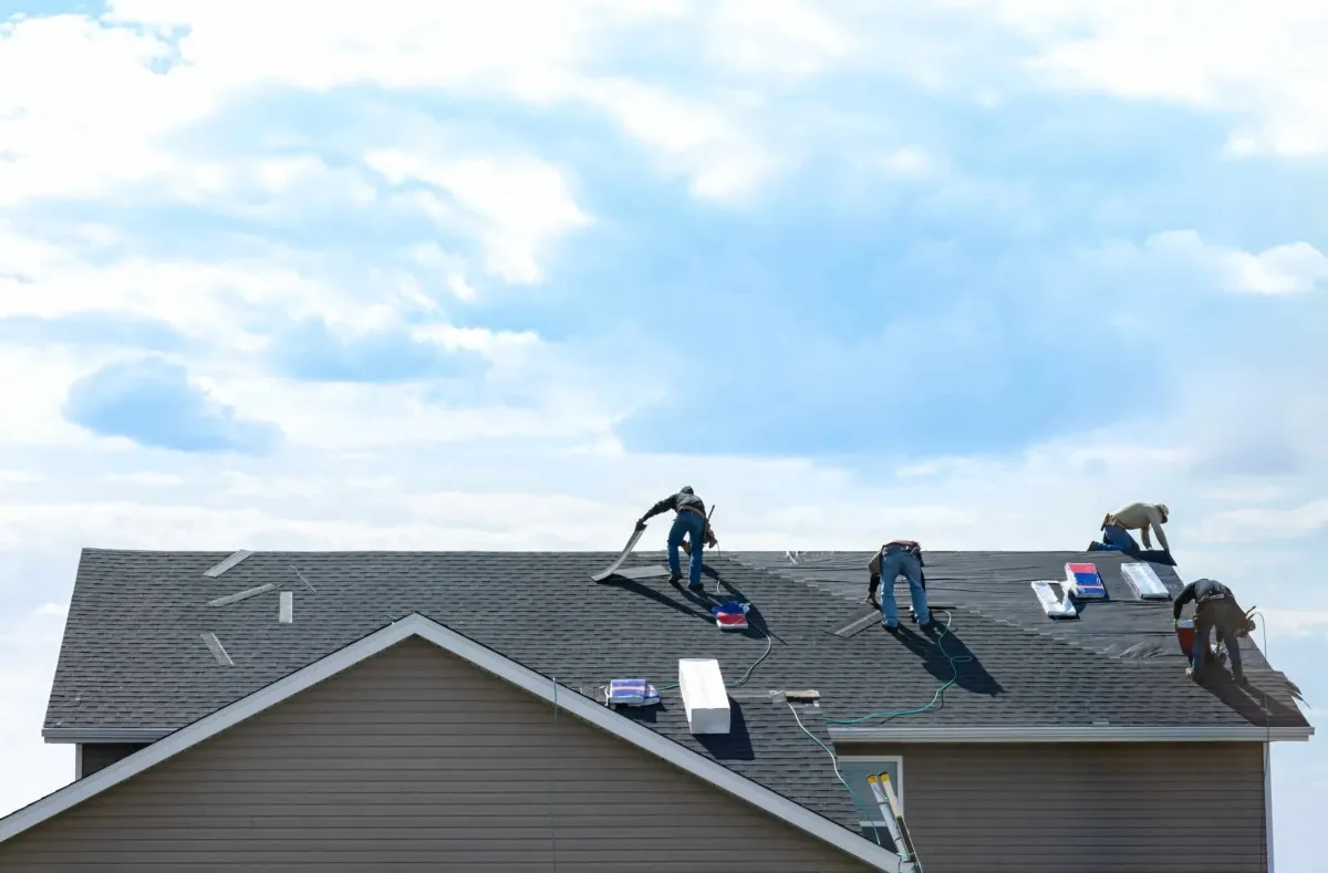 a group of roofers on roofing installation