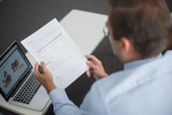 Employer reviewing VA job application form