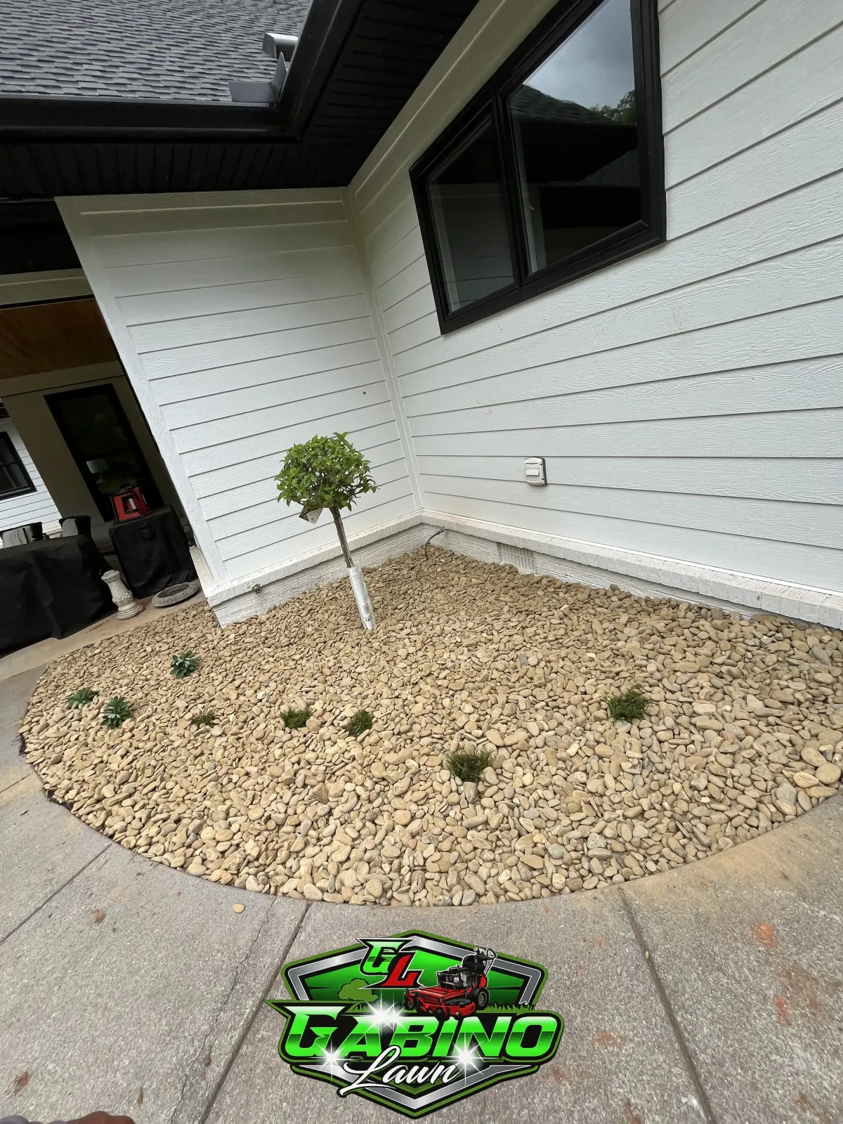 river rock planting residential Knoxville TN Gabino Lawn Care