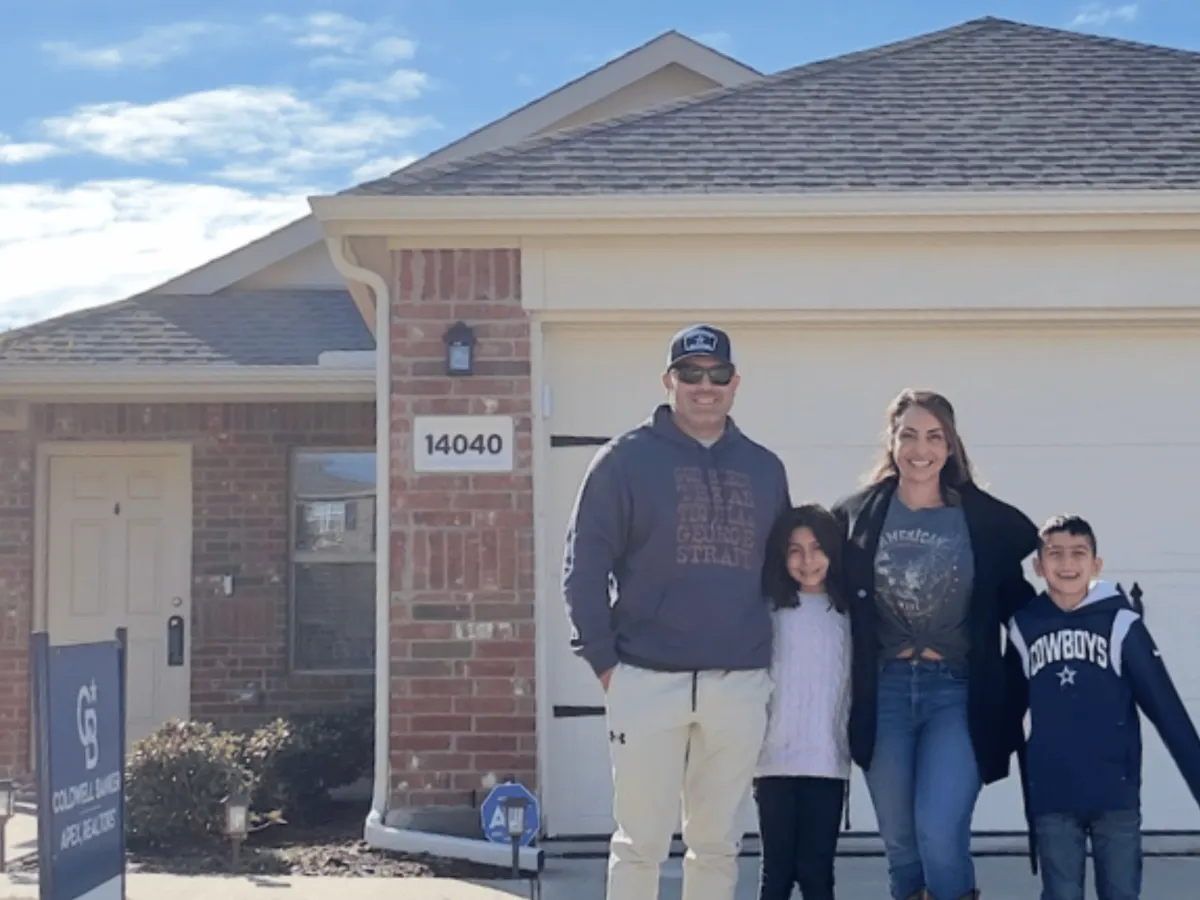 Boris and Amanda Palomino family outside their home representing their real estate portfolio