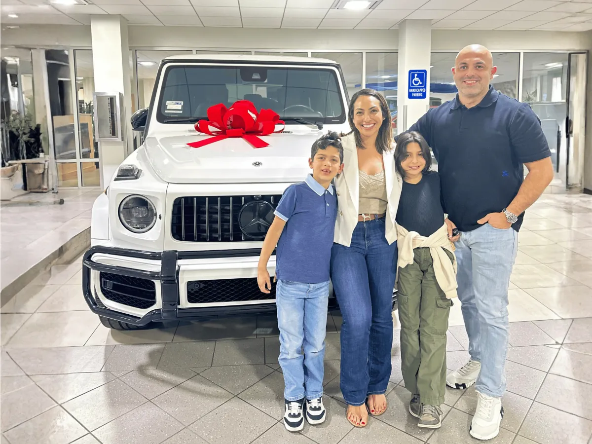 Family with Mom's dream G-Wagon Mercedes