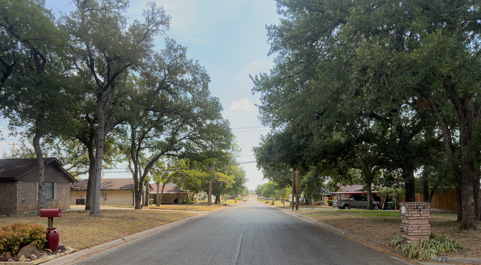 Tree-lined residential street in Northeast Mineral Wells, Texas