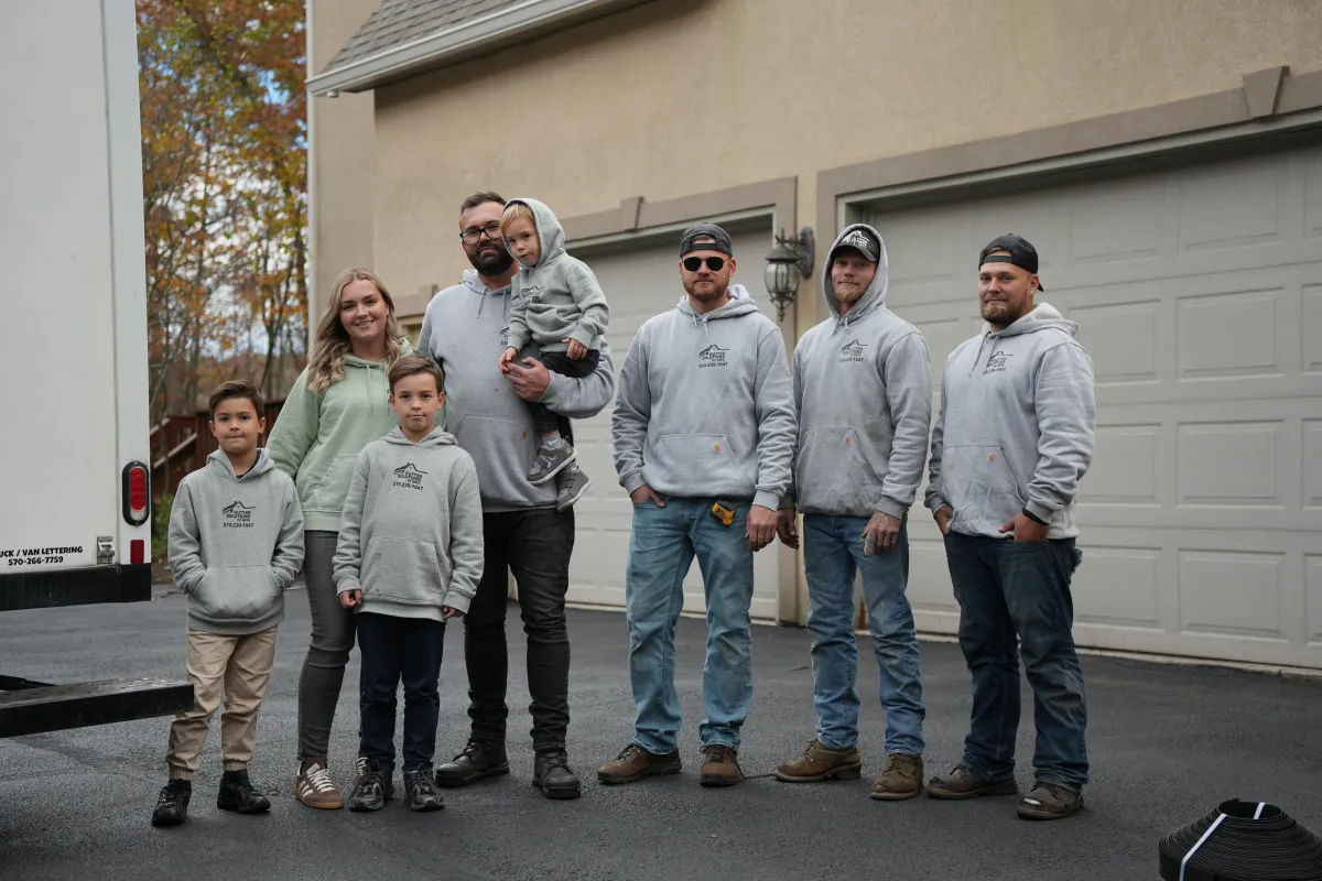 Ivan the owner and Gutter Solutions Family along with the crew