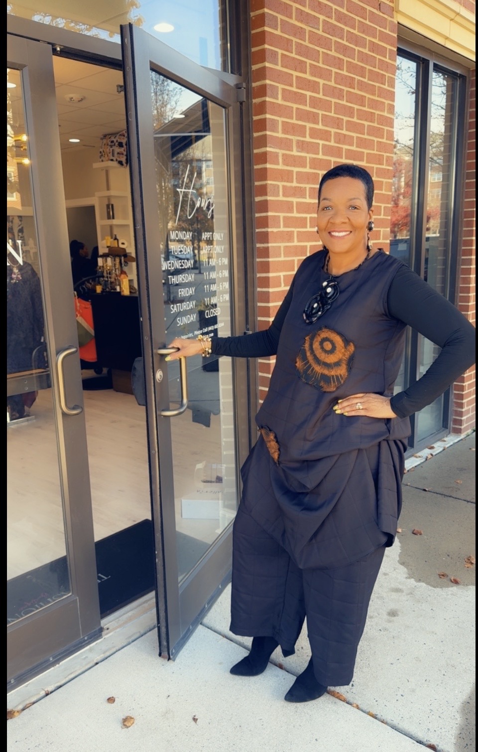 Phyllis, founder of Trivashion, in an elegant fashion moment