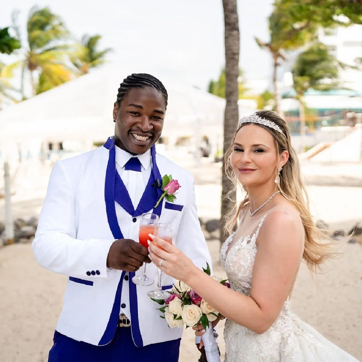 Bride and groom toasting after destination wedding ceremony
