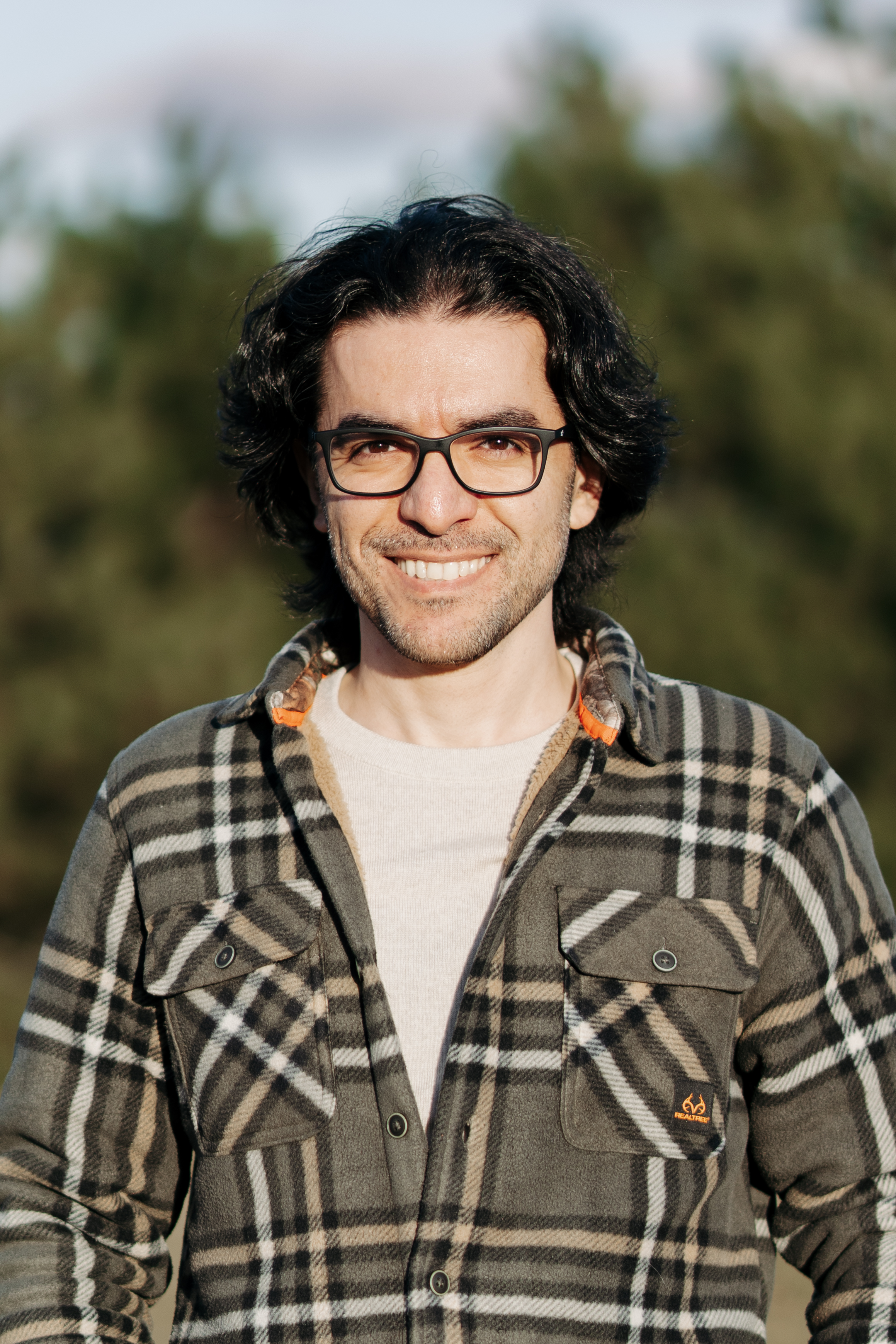 Amir Fathalian Toronto wedding photographer smiling at the camera