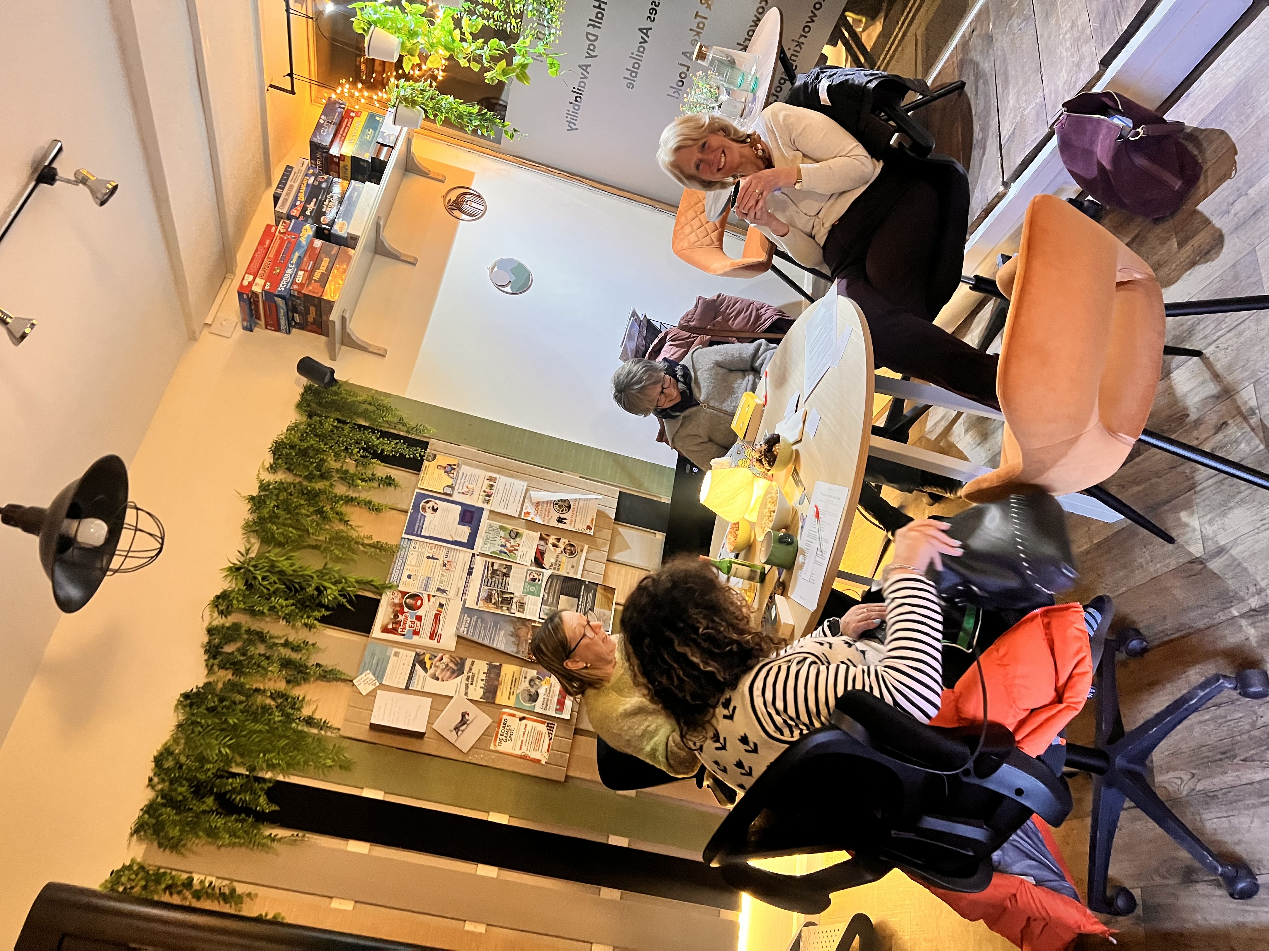 Women reading at Whisper and Wine Book Club