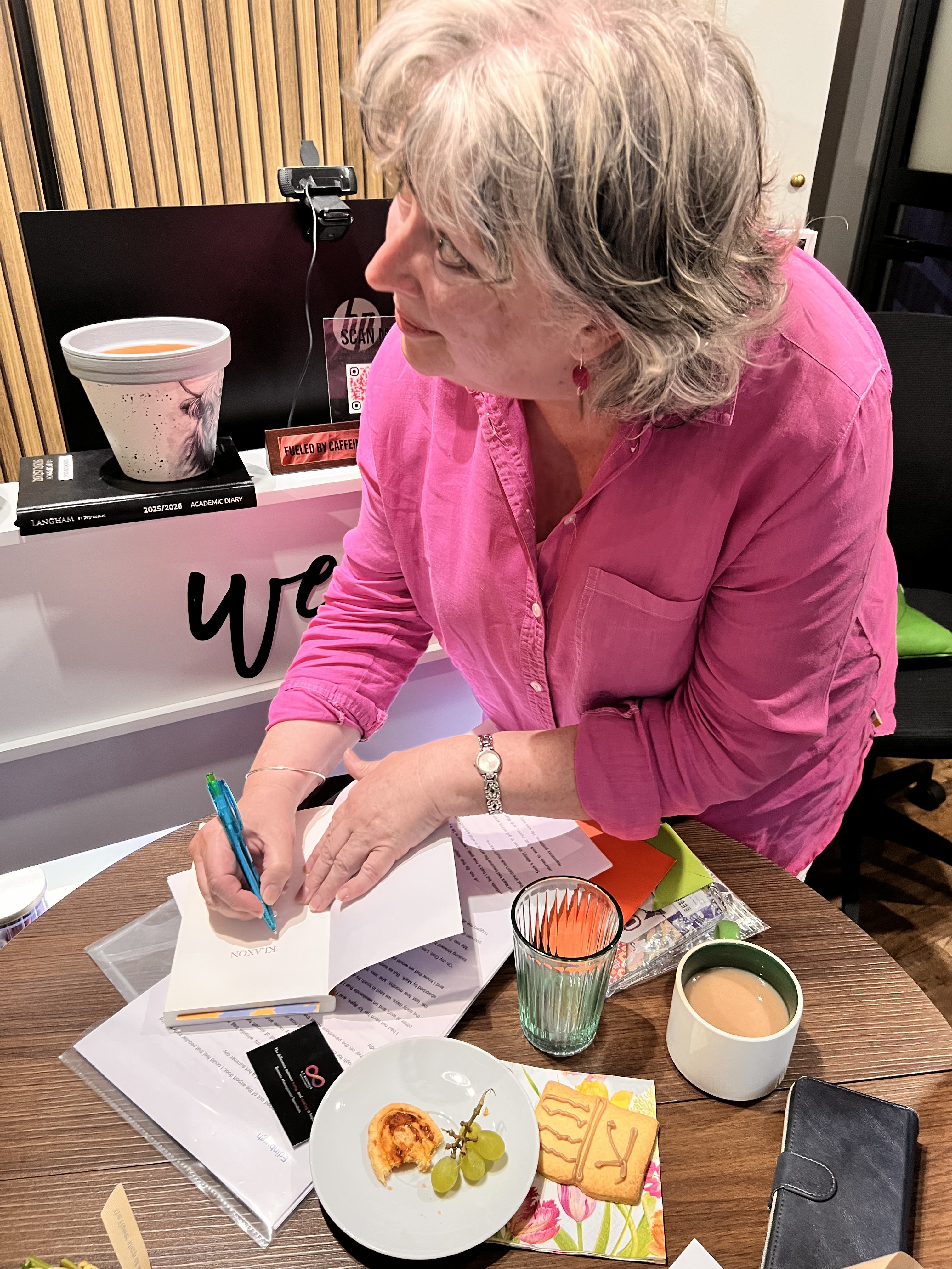 Women reading at Whisper and Wine Book Club
