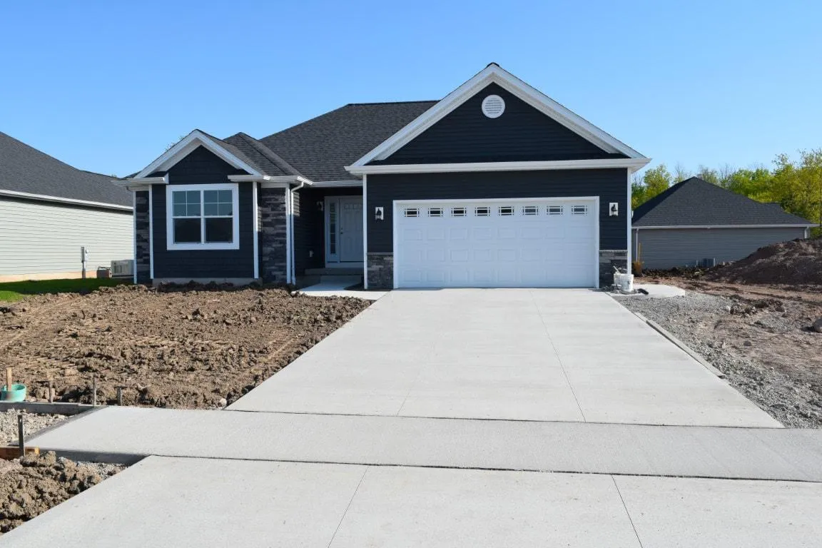 slab concrete driveway in front of new home Roseville, CA