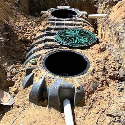 a septic tank replacement prior to being covered back up in Spring Hill, KS