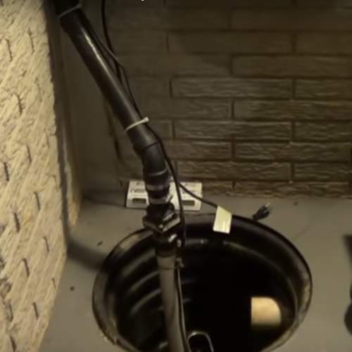 a sump pump replaced in a basement in a house in northern spring hill, ks