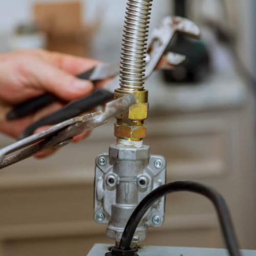 close up of a new gas line install on a stove in spring hill, ks