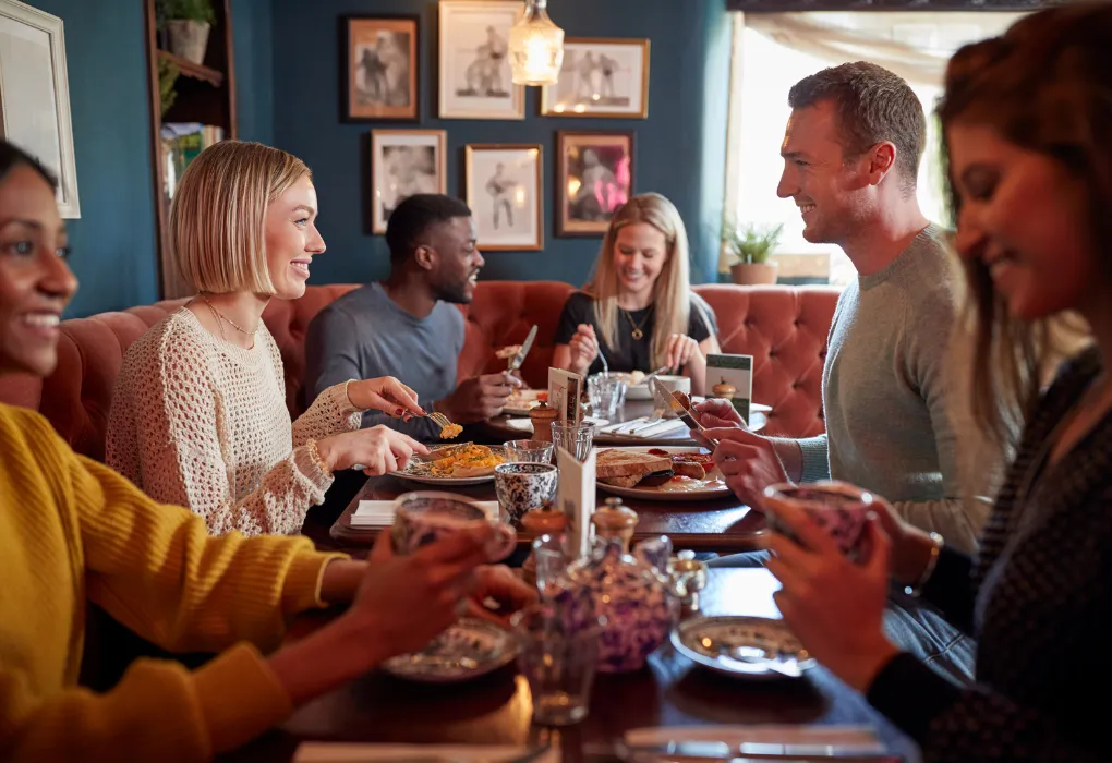 architectural photography of building with people in it during nighttime