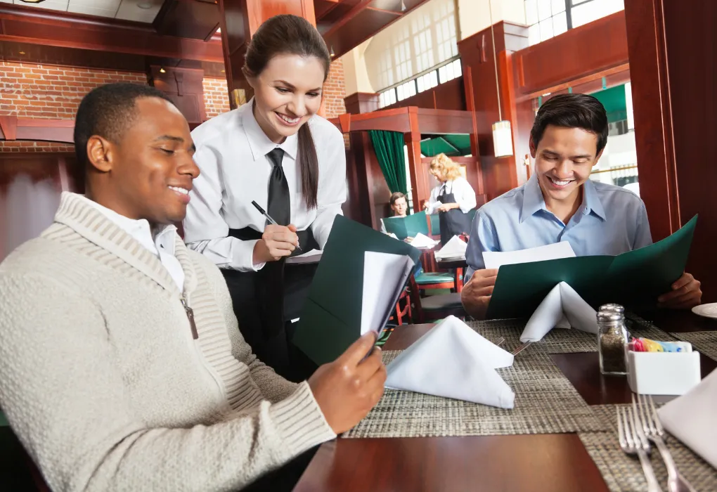 architectural photography of building with people in it during nighttime