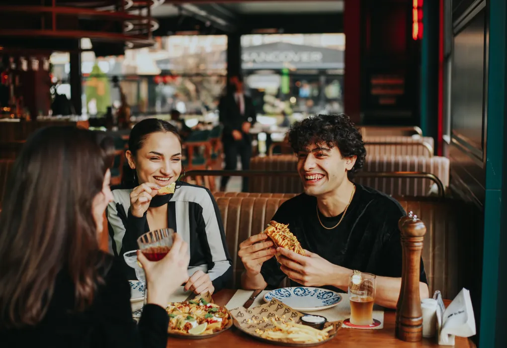 architectural photography of building with people in it during nighttime
