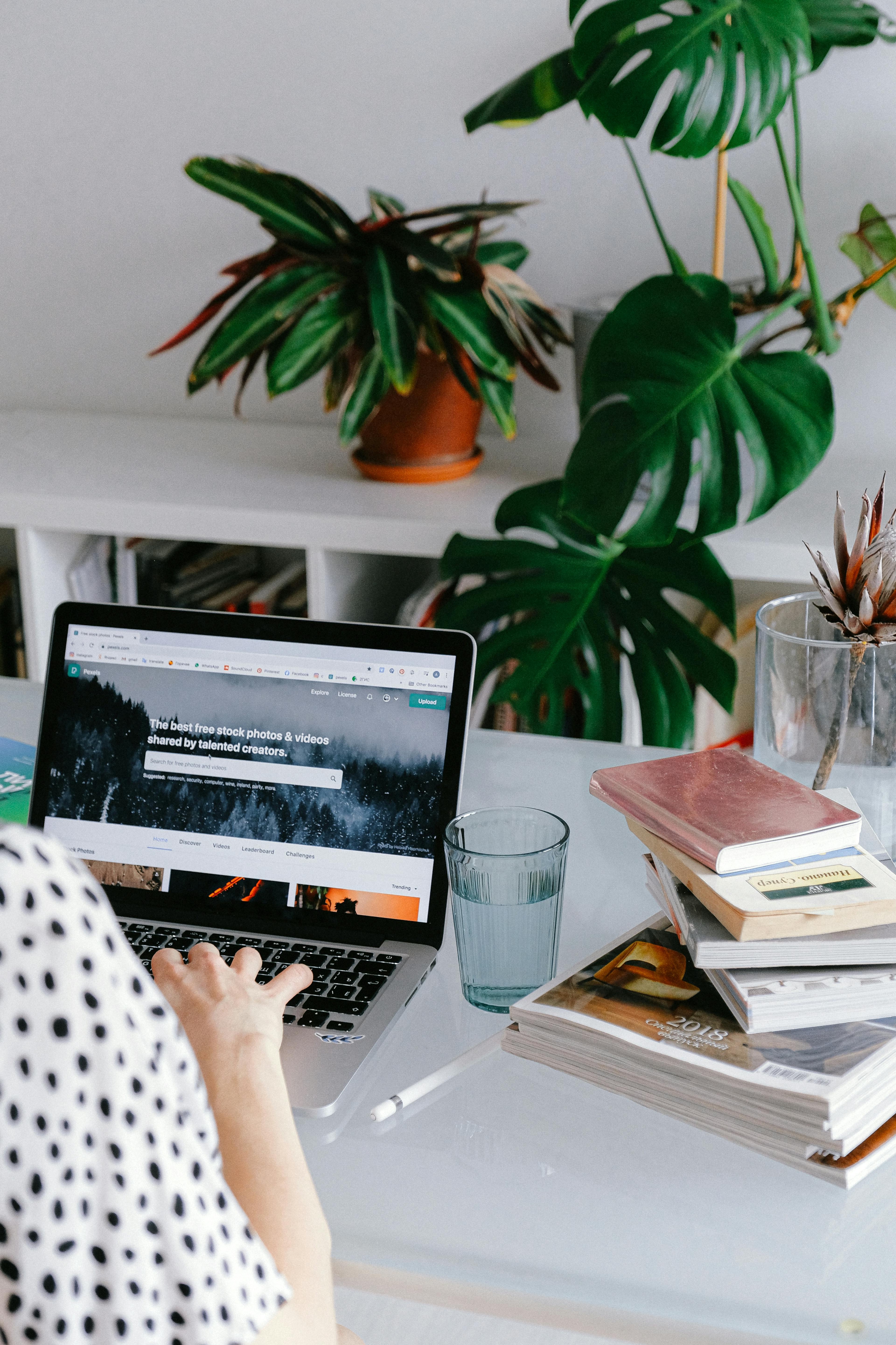bright office space, laptop on desk used for website design