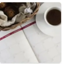Business scheduling and planning workspace with coffee