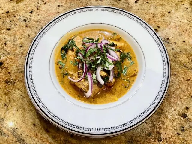 Thai Red Salmon Curry with Red Onion garnish