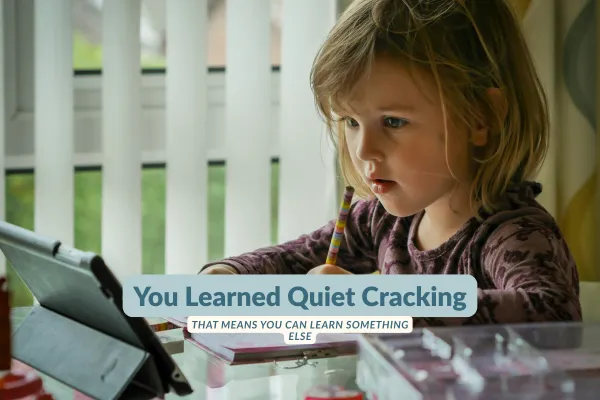Child looking at a tablet, holding a colored pencil. Text overlay: 'You Learned Quiet Cracking — That Means You Can Learn Something Else
