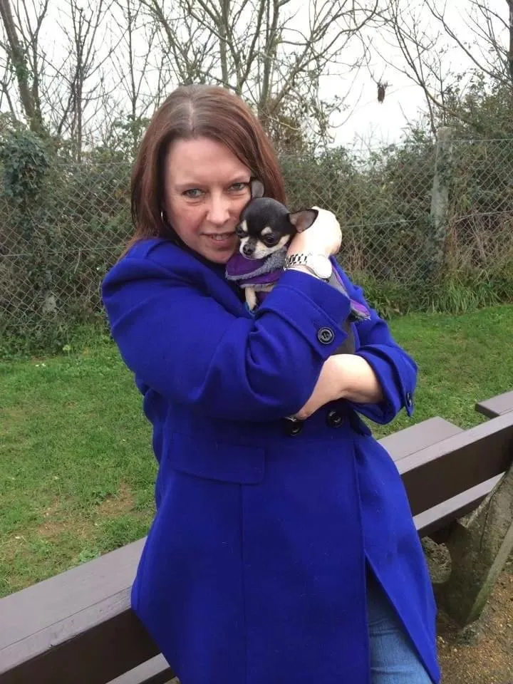 Veronica Pullen holding Chihuahua 