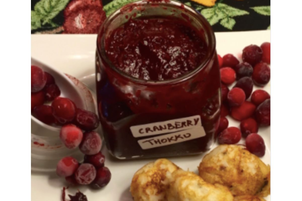 Tangy South Indian cranberry thokku – spiced relish simmered to a glossy finish.