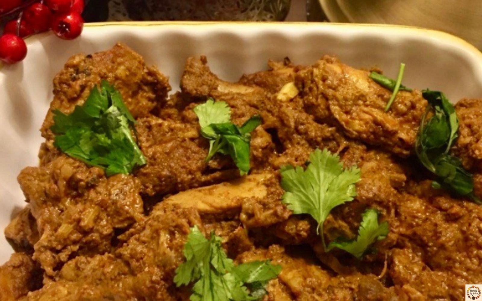 Mangalorean chicken ghee roast — spicy red masala chicken cooked in ghee.