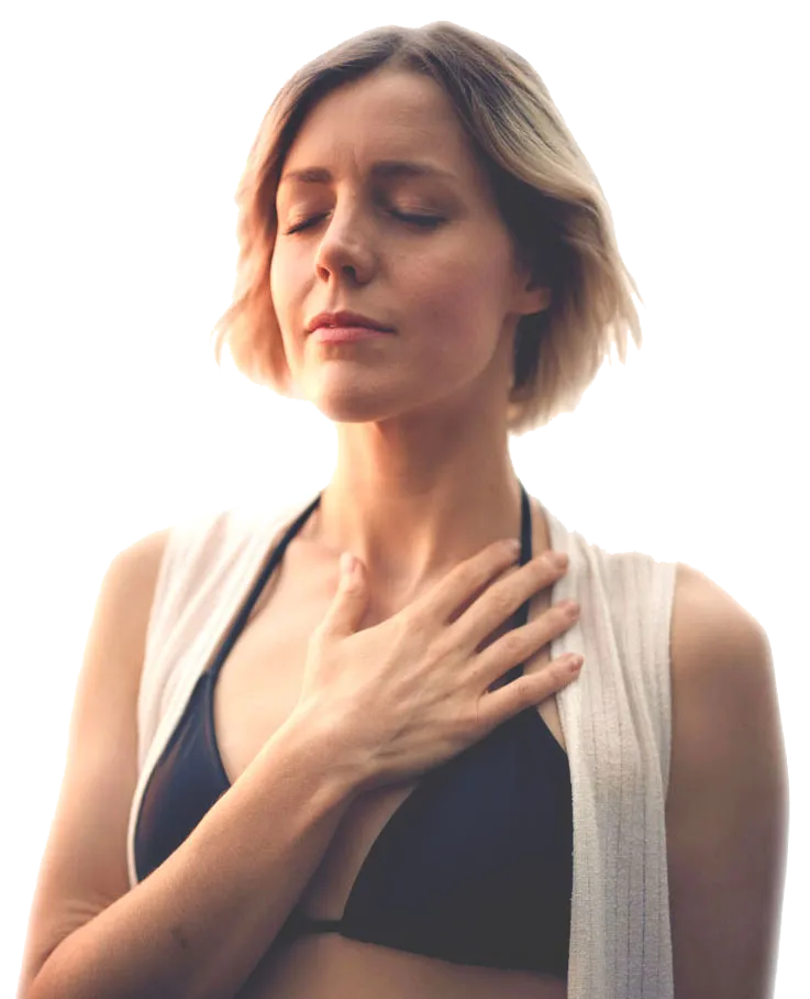 Woman with eyes closed, hand on heart