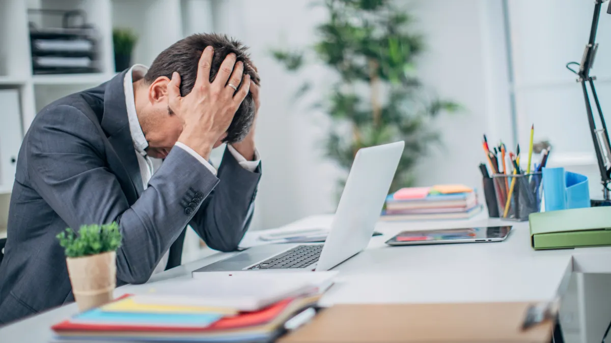 happy sales man on a business call