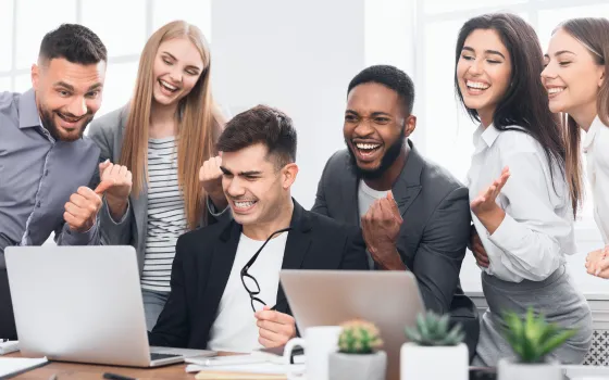 image of happy sales man on a call